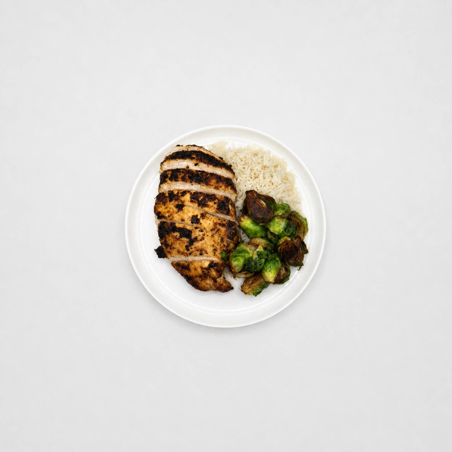 Blackenened Chicken Breast with White Rice and Roasted Brussel Sprouts